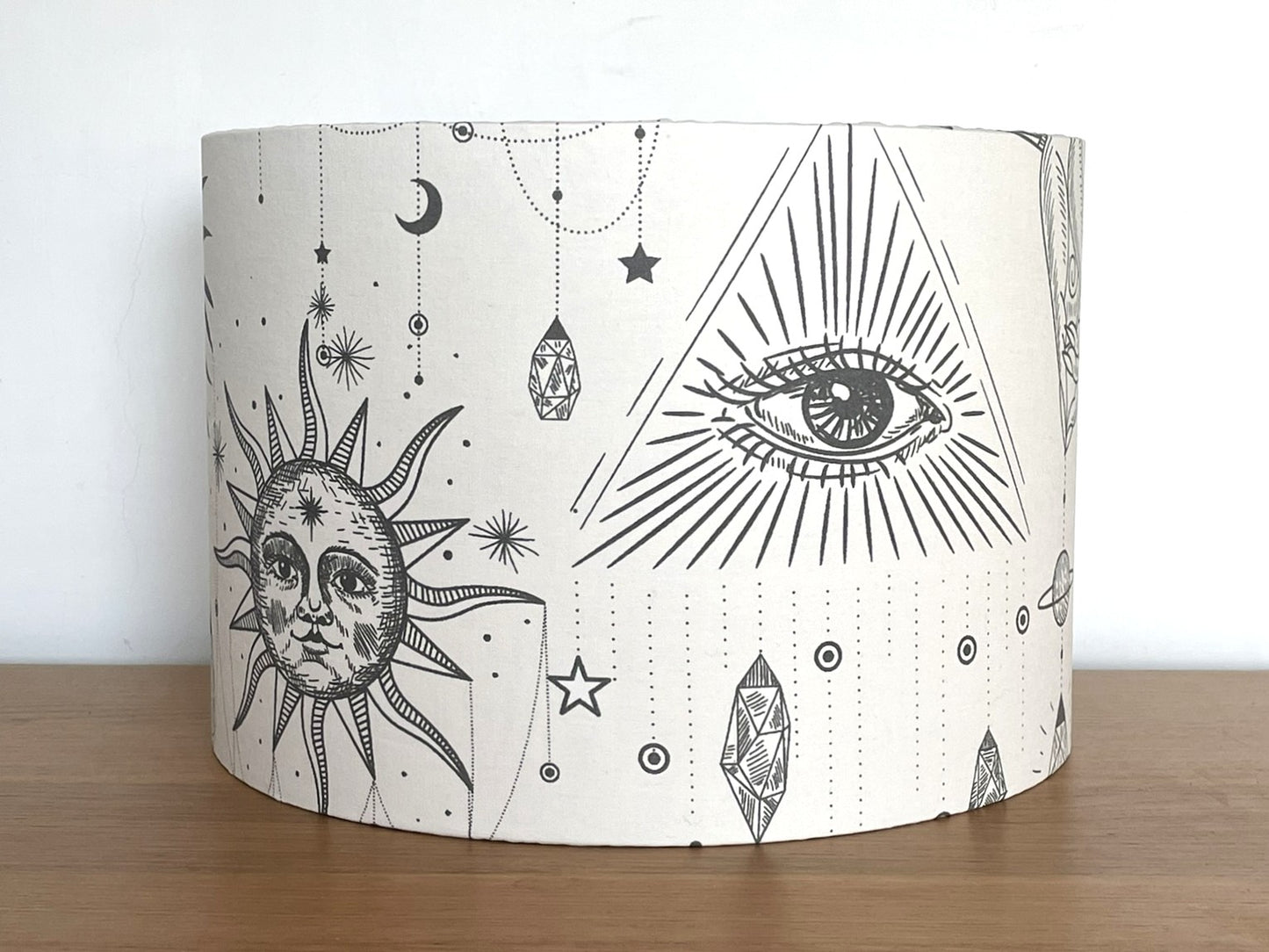 Decorative lampshade with celestial designs