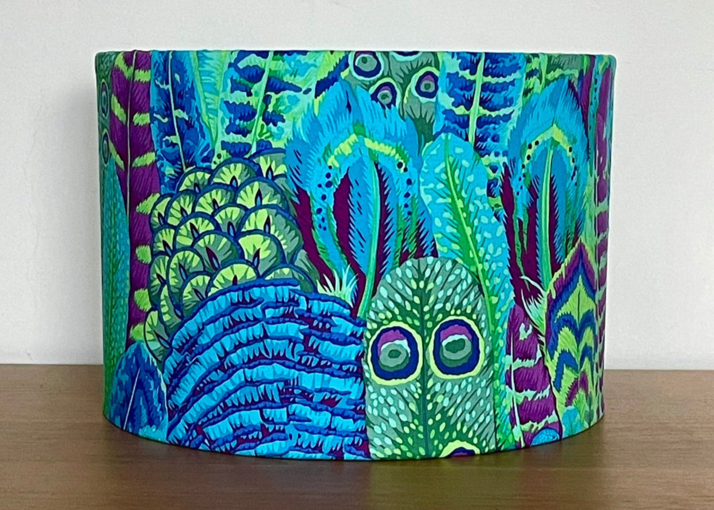 Botanical lampshade with tropical feather design in bright blue, purple and green