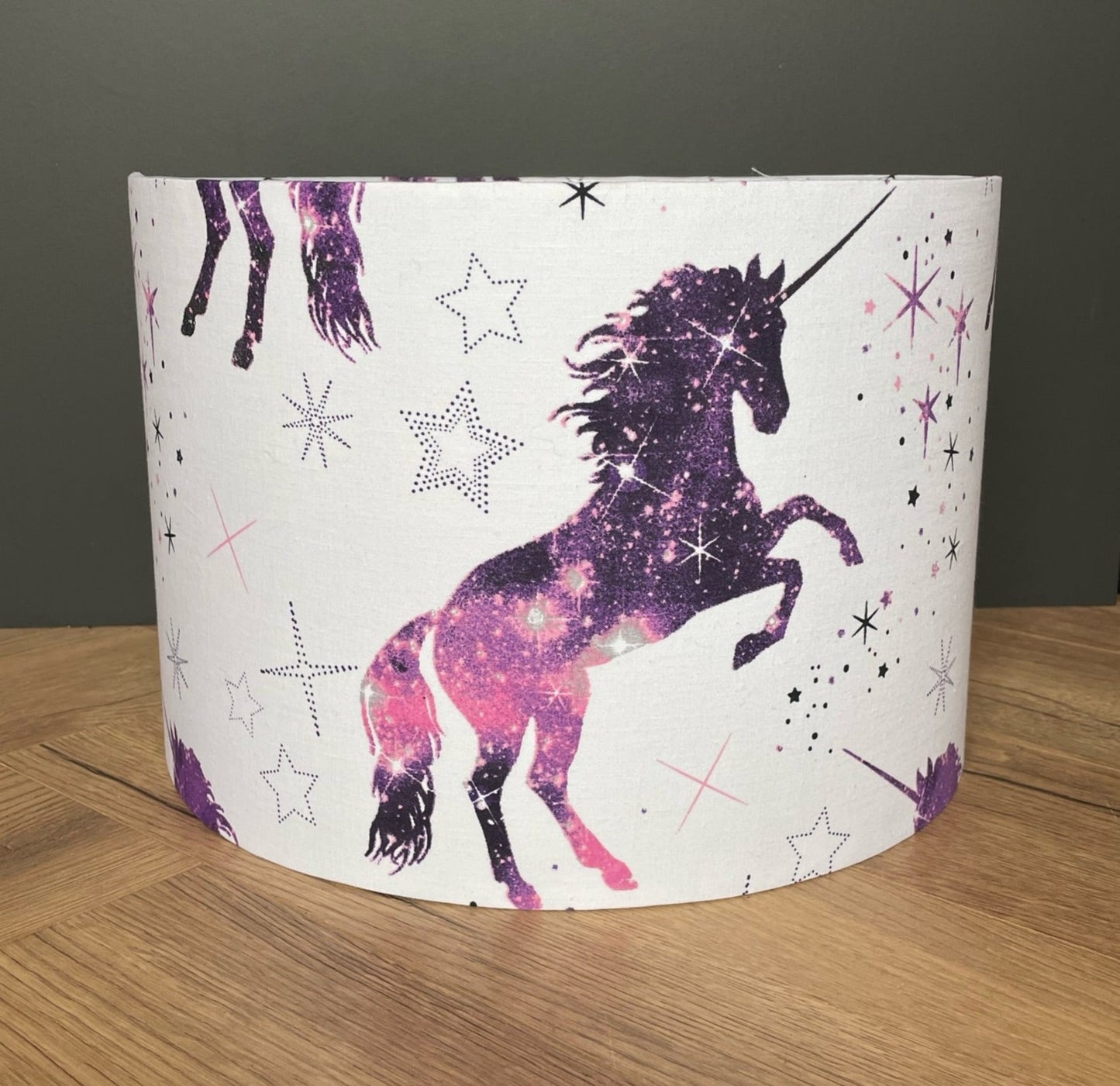 Pink-and-purple-unicorn-lampshade-with-stars-ceiling-pendant