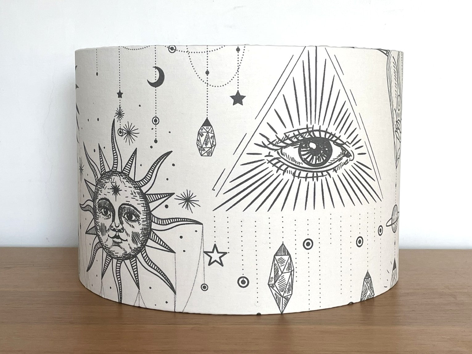 Decorative lampshade with celestial designs