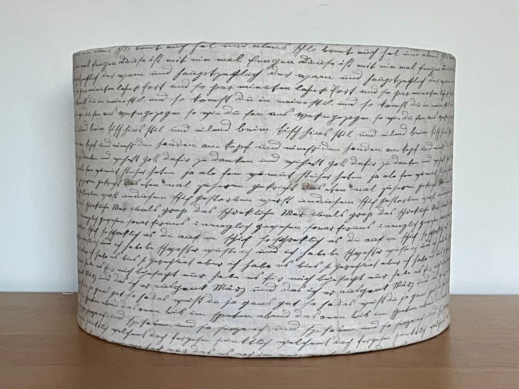 Tim Holtz Eclectic Elements charcoal fabric lampshade. Vintage handwriting on a distressed cream background. With a choice of white or metallic lining.