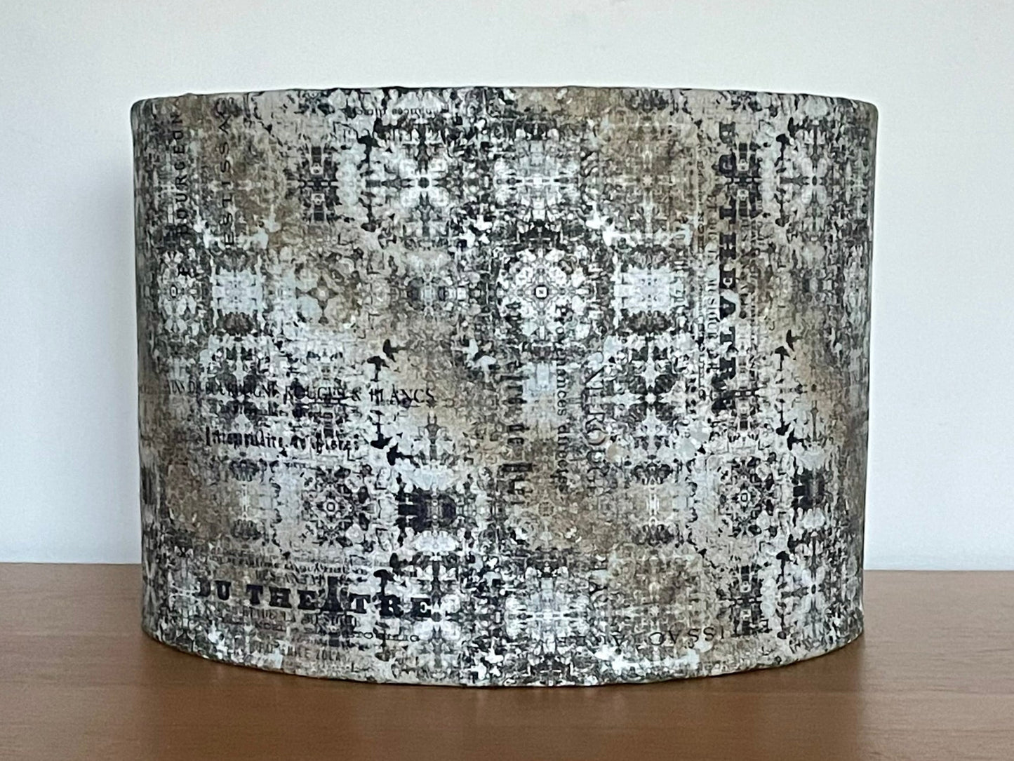 Textured lampshade with a pattern on a wooden surface