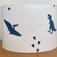 White rum lampshade with blue dinosaurs