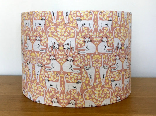 pink white and yellow cat lampshade